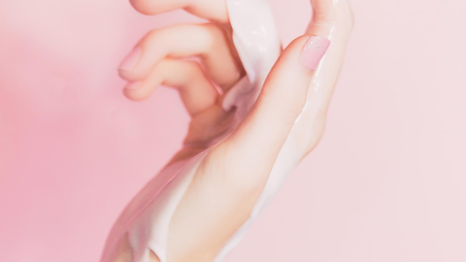 Sex, Hand, Orgasmus, rosa Hintergrund