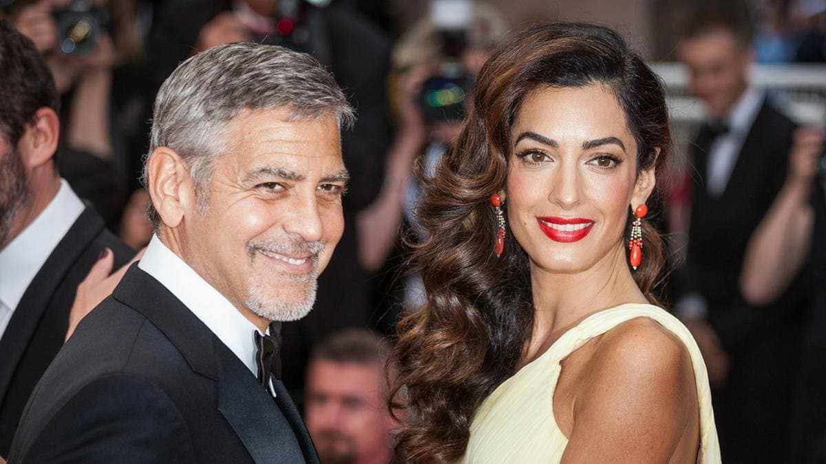 George Clooney an der Seite seiner zweiten Ehefrau Amal. © taniavolobueva/Shutterstock.com