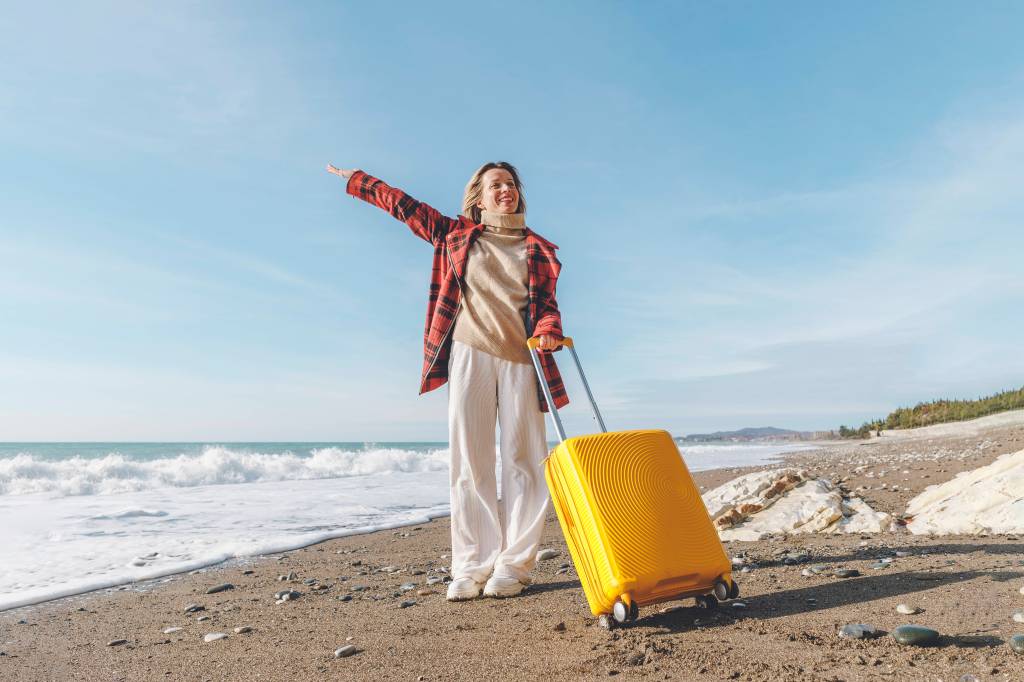 Frau Koffer abgeben Hotel Urlaub reise