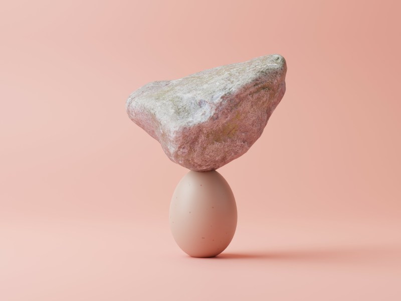 7 Säulen der Resilienz Stein liegt auf Ei