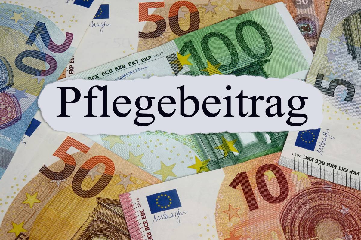 Auf einem weißen Zettel steht das Wort 