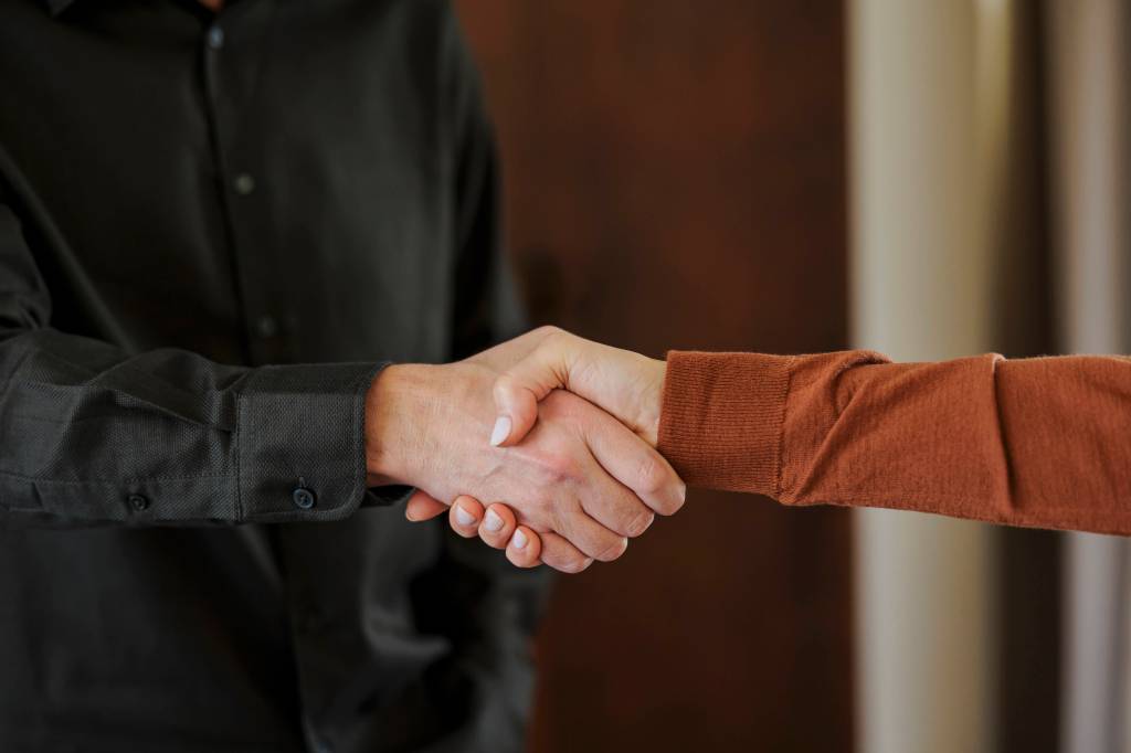 Beförderung Handschlag